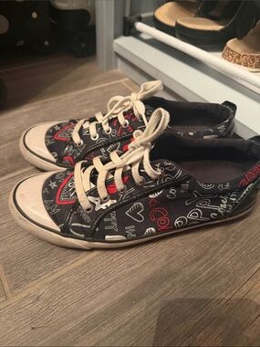 Coach brand Black Graphic Lace-Up Sneakers with Red Accents